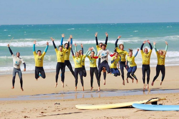 Surf Beaches (2) AltaVista surfers jumping for joy at the beach surf camp