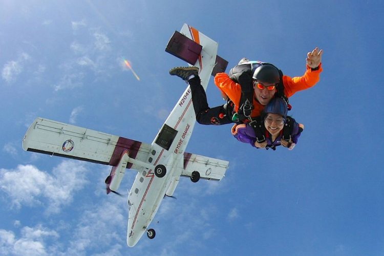 An AltaVista guest with instructor on a Tandem skydive near Portimao